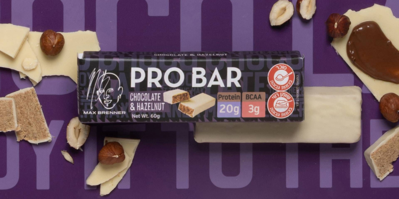 מארז 18 חטיפי חלבון בטעם שוקולד לבן וקרם אגוזים סדרת Pro Bar מבית Max Brenner – כל חטיף 60 גרם